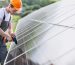 man-worker-firld-by-solar-panels